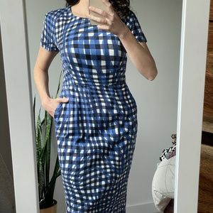 Blue fitted sheath dress with pockets